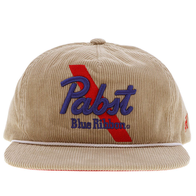 front of Pabst x Hooey corduroy tan hat with Pabst blue and red logo patch on front