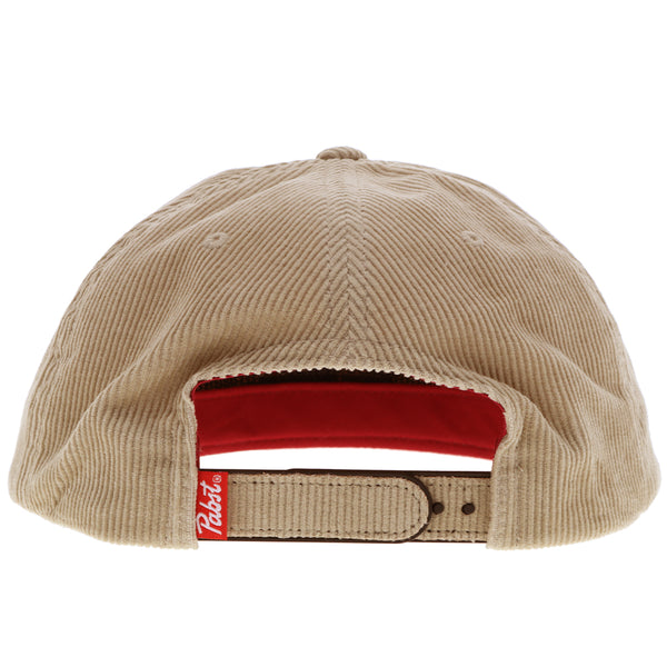 back of Pabst x Hooey corduroy tan hat with red and white Pabst tag, corduroy panels all over and corduroy snap bands