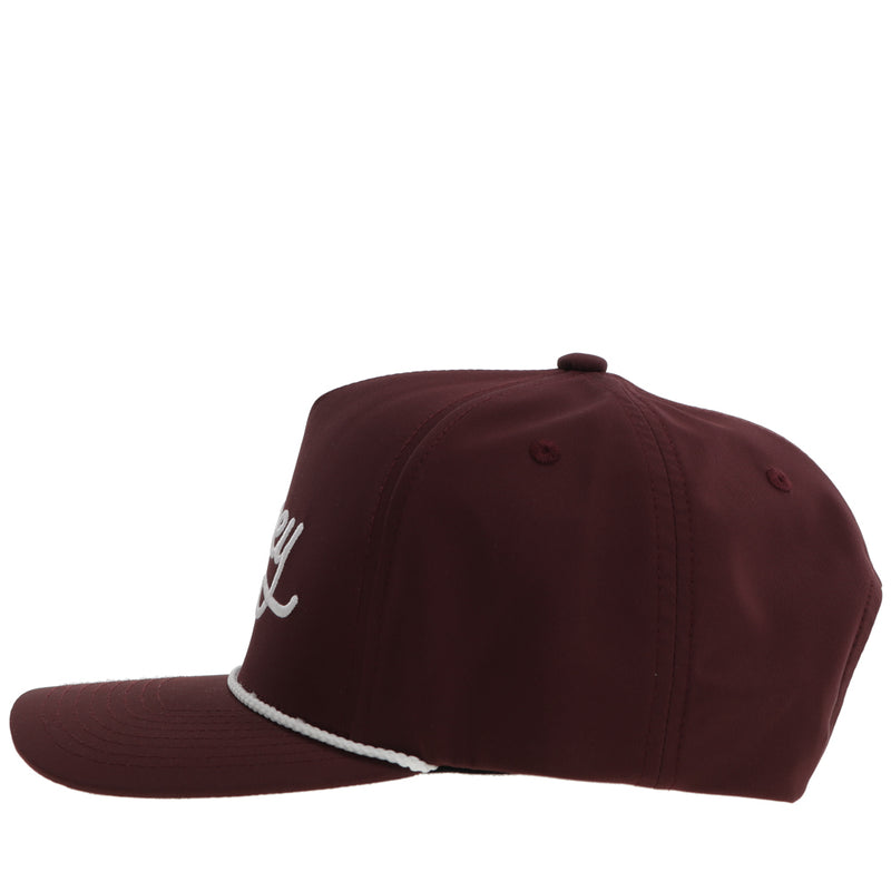 the left side of the maroon hat with white rope detail 