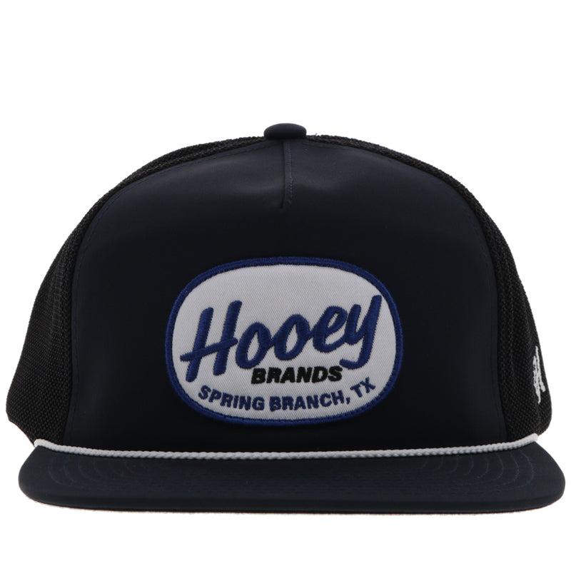 front of all black Hooey hat with white rope detail and blue and white logo patch