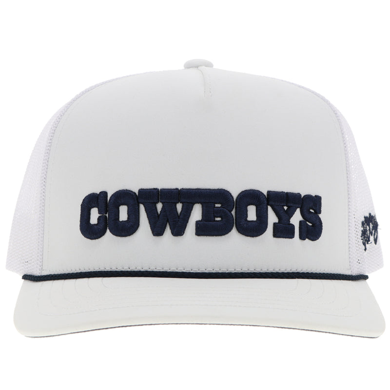 front of white Dallas Cowboys hat with blue Cowboys embossed patch across the front and blue rope detail in crease