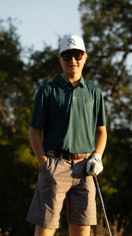 male model posing in hooey golf gear