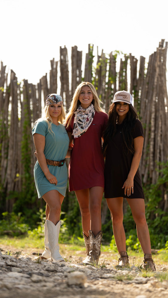 three female models posing in Hooey clothing