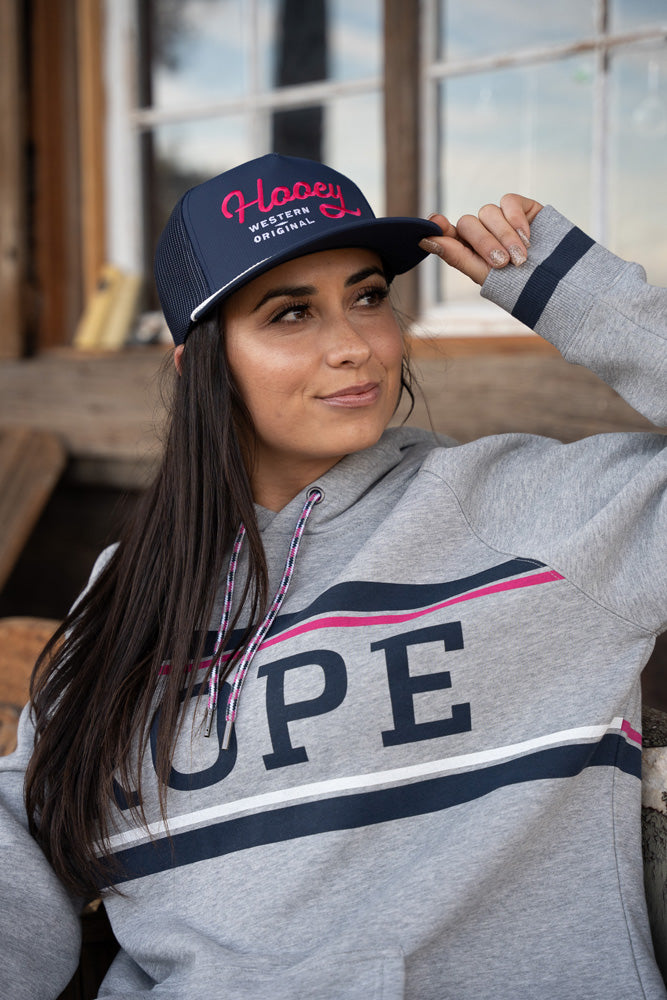 heather grey hoodie with black, pink, and white Rope Like A Girl logo and black and pink Hooey hat