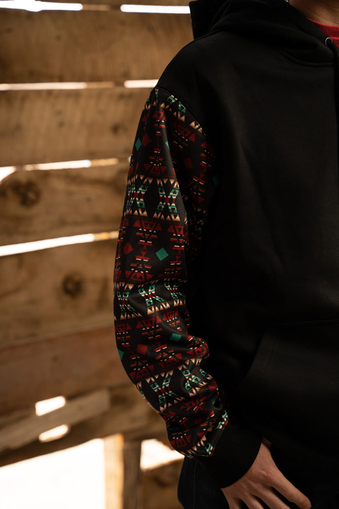 close up of the sleeve on the summit black hoody with red and blue aztec pattern on sleeves 