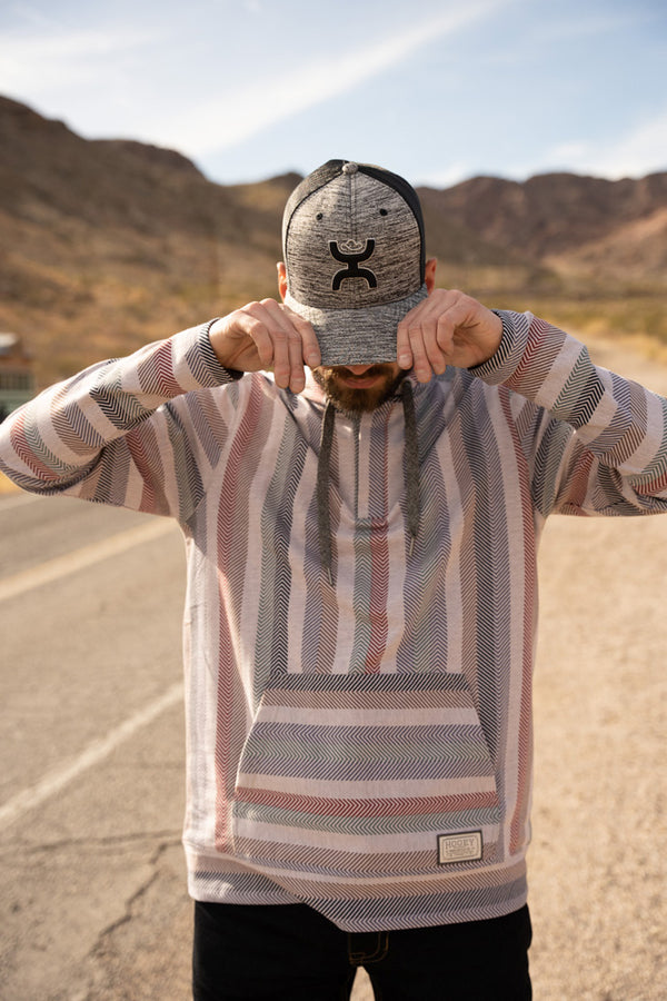 model repping the Jetty serape hoody in lifestyle photo