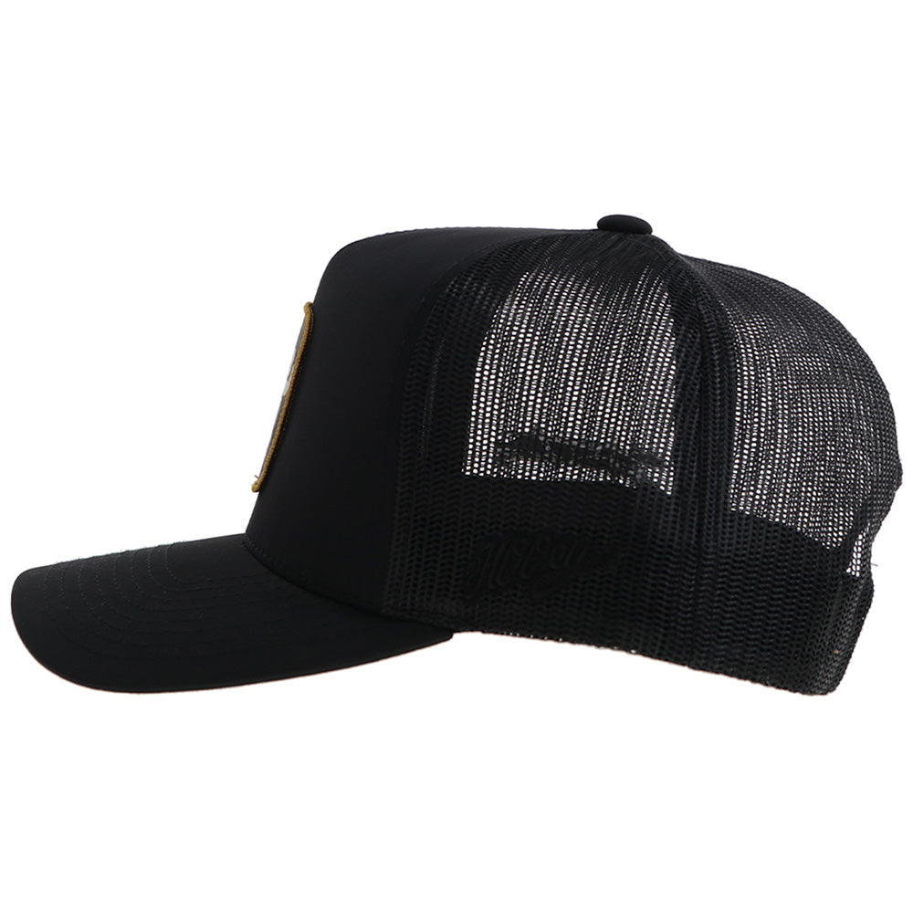 left side of black on black hat