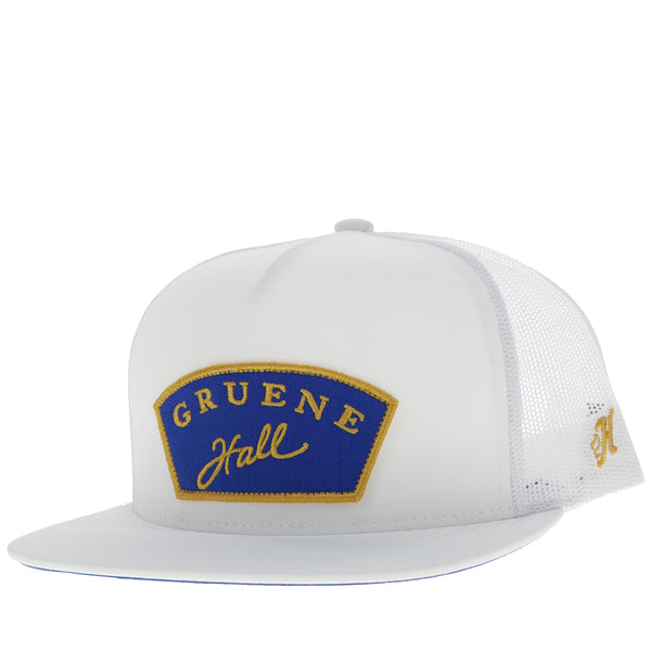 profile of white on white Gruene Hall hat with blue and gold patch