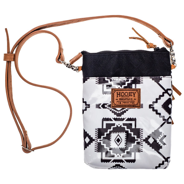front of black and white Aztec pattern cross body