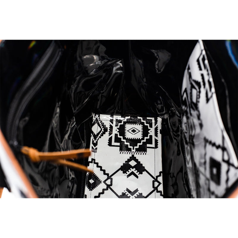 interior of black and white aztec pattern hand bag