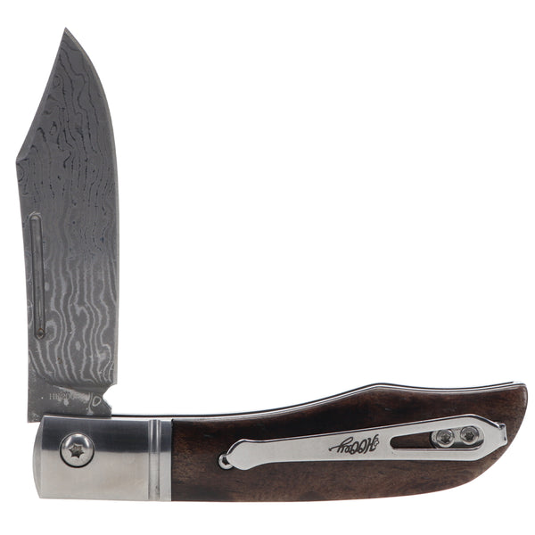 Hooey folder blade knife in brown with silver clip, and wood grain pattern on blade