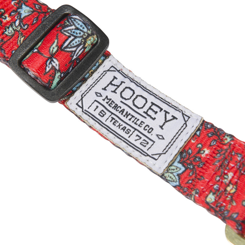 Close-up image of the tag on the western floral pet walking harness