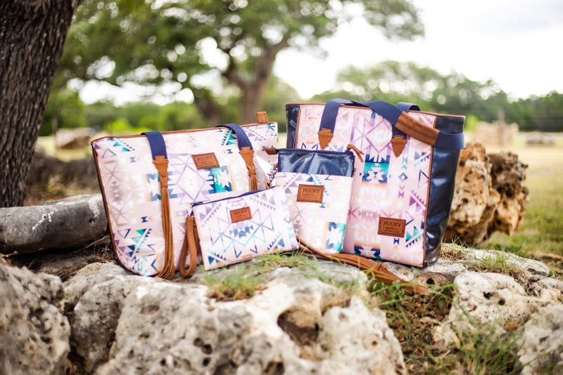 Pink and blue aztec pattern hand bag collection
