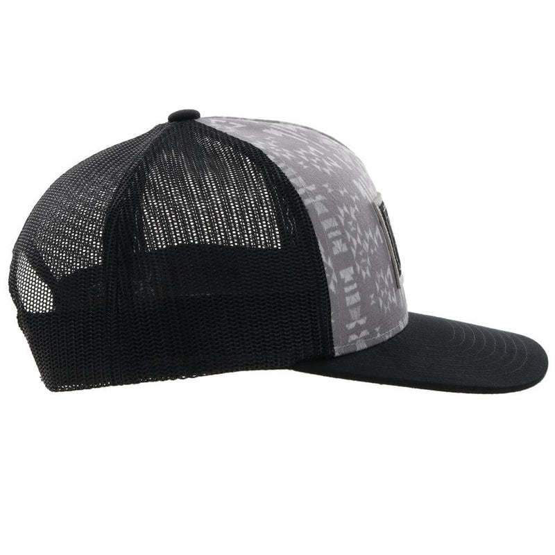 right side of the Doc grey and black hat with Aztec print and black and white patch