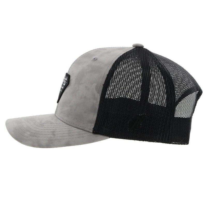 left side view of the grey and black RLAG hat