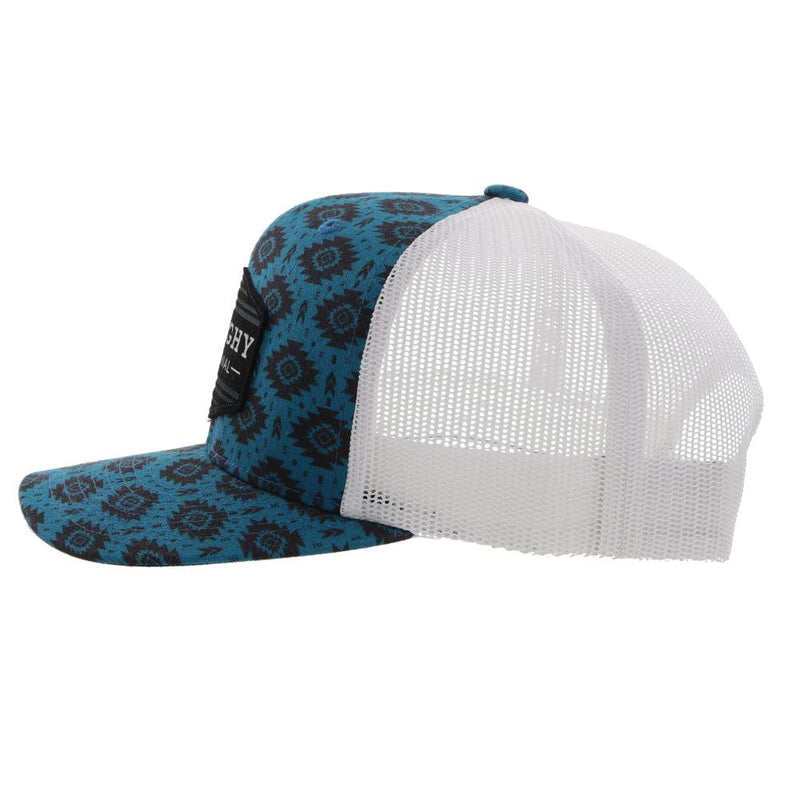 left side view of the Tribe blue and white hat with black Aztec print 