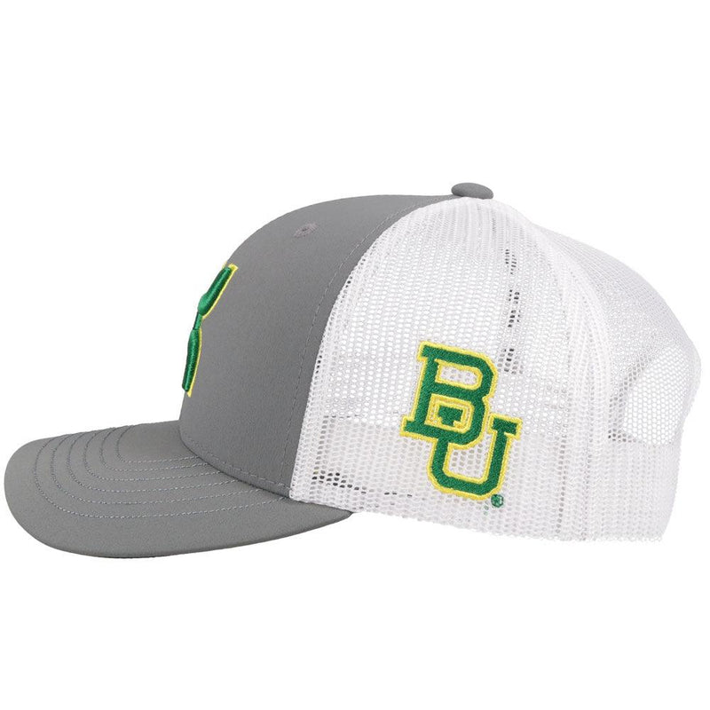 left of the Baylor University grey and white hat with green and gold Hooey patch