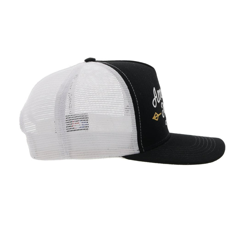 left side view of the Black and white AMCC Hooey hat with gold arrow detail