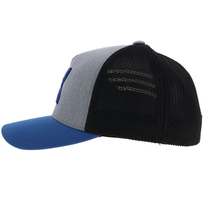 left side of the Blue, black, and grey Coach hat