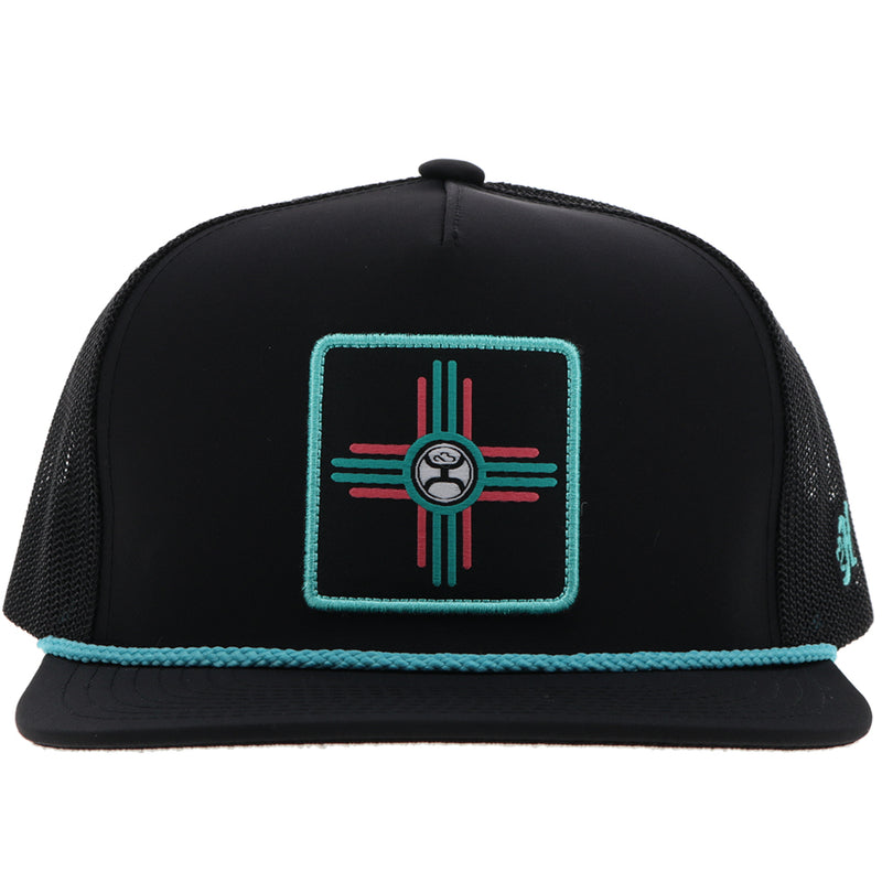 front view of the Zia hat in black with turquoise and pink rope details