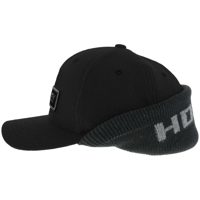 left side of black Hooey hat with ear cover attached