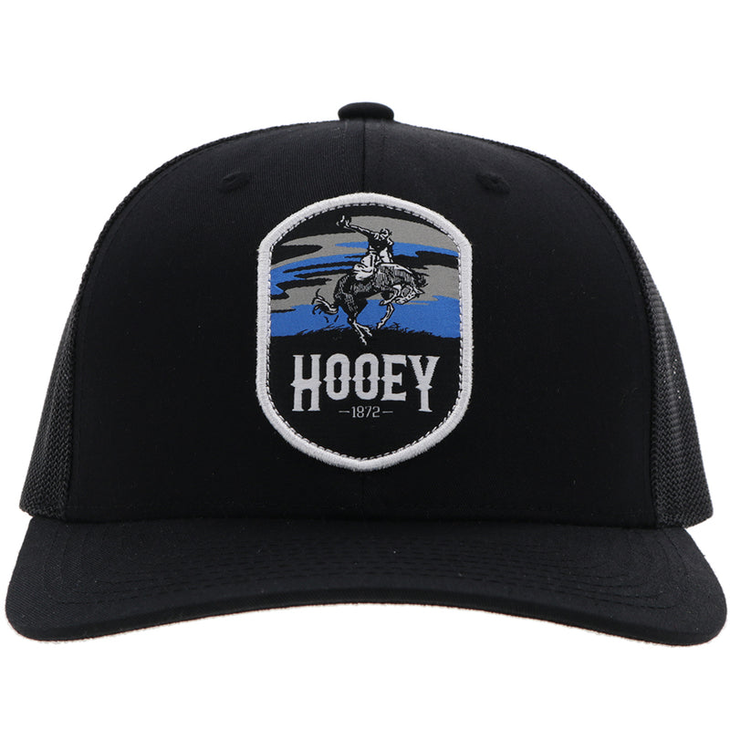 front of the black on black Cheyenne hat with blue, white, and black patch