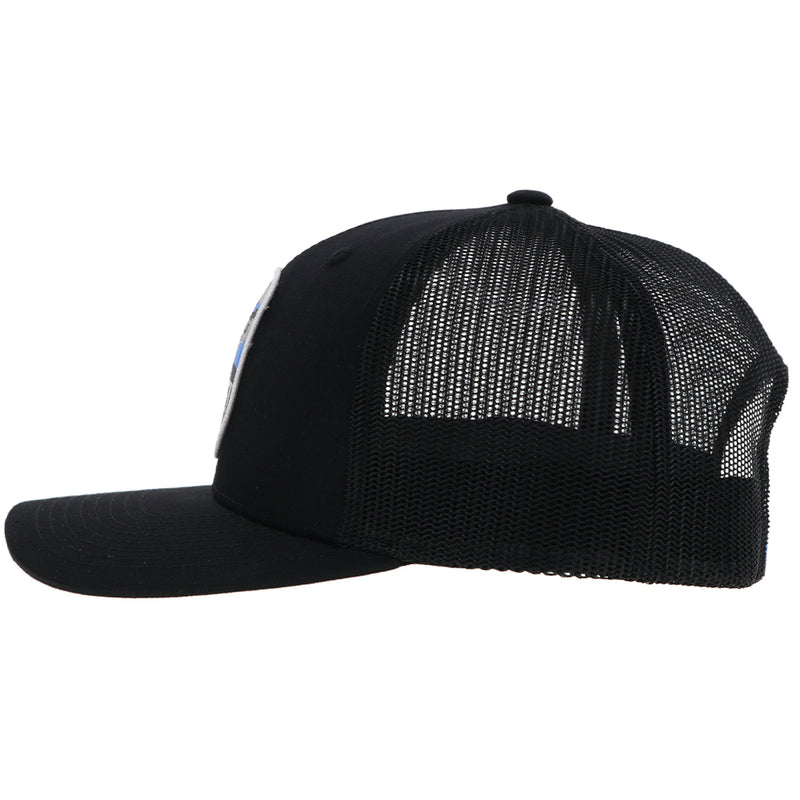 left side of the black on black Cheyenne hat with blue, white, and black patch