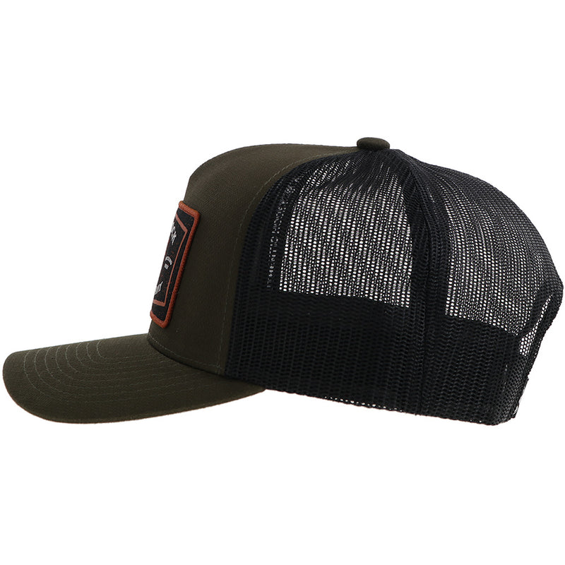 left side of the Dark green and black hooey hat with orange, black, white Rank Stock Rodeo Company patch
