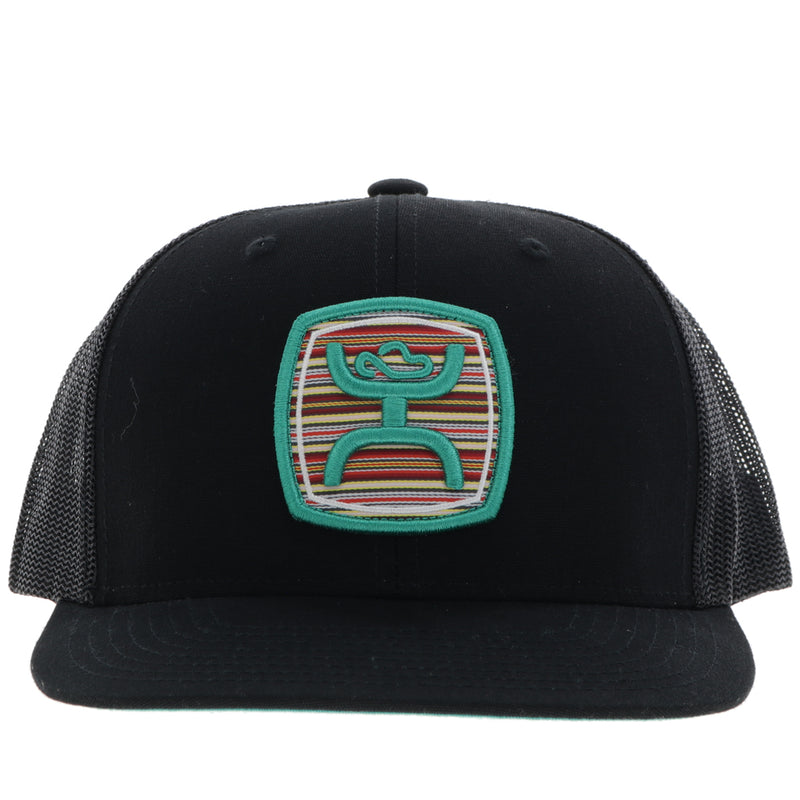 front of all black Hooey hat with serape and teal patch
