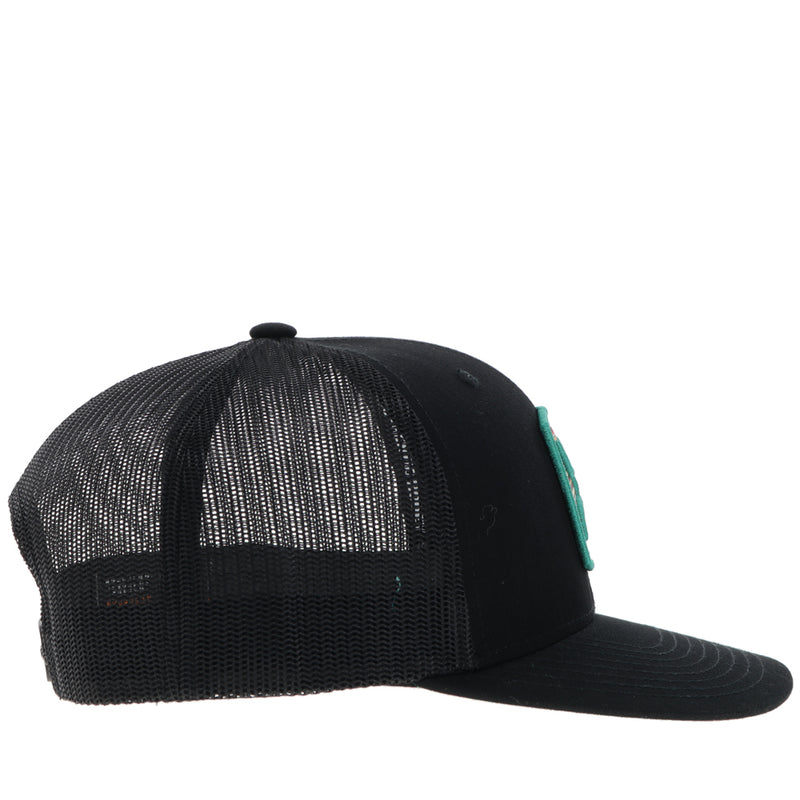 right side of all black hat with teal patch