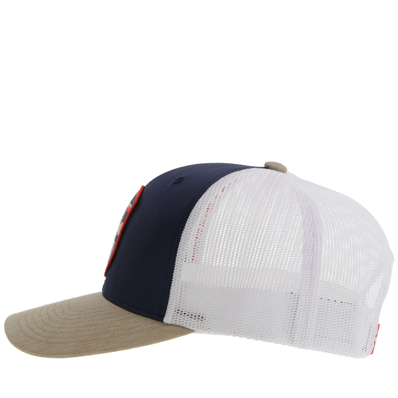 left side of tan, white, and navy Cheyenne hat