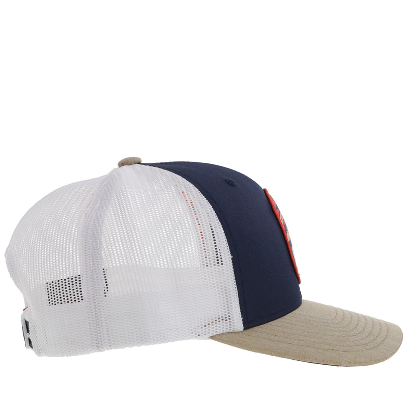 right side of navy, tan, and white hooey hat.