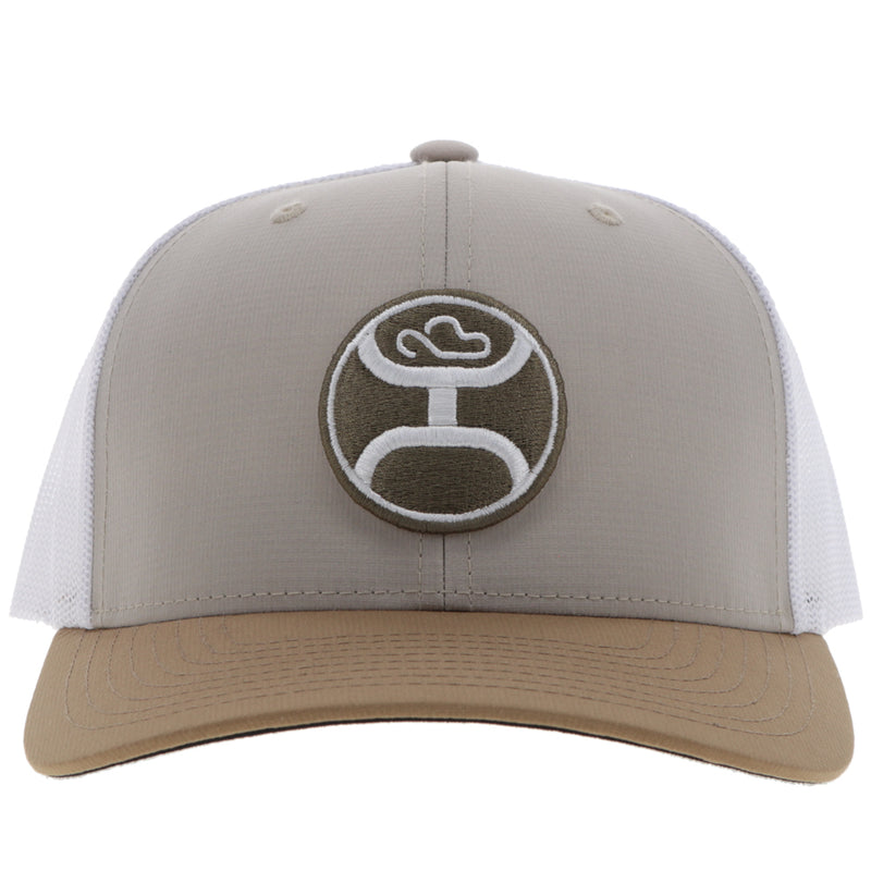 front of light grey, tan, and white hat with black and white Hooey logo patch