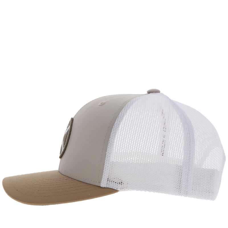 left side of tan, light grey, and white hooey hat