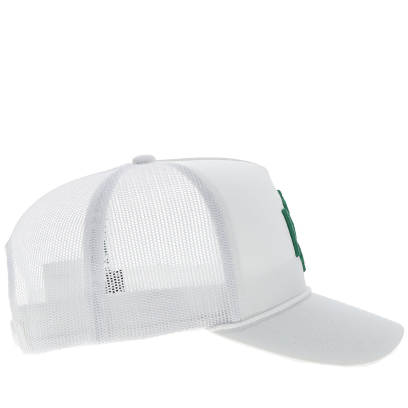 right side of white on white hat with green logo patch on front