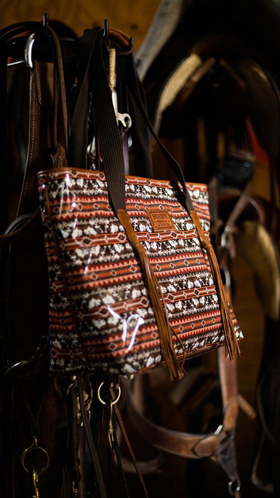 brown, red, black aztec print tote bag on tack nail