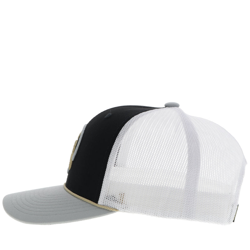 left side of black white, grey Hooey Roughy hat with gold and white patch and gold rope detail