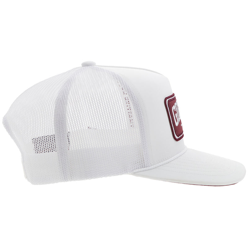 right side of solid white with maroon patch hat
