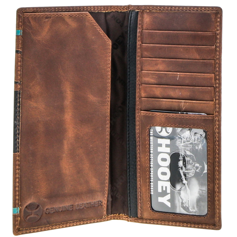 inside of brown leather bi fold with teal details on edges