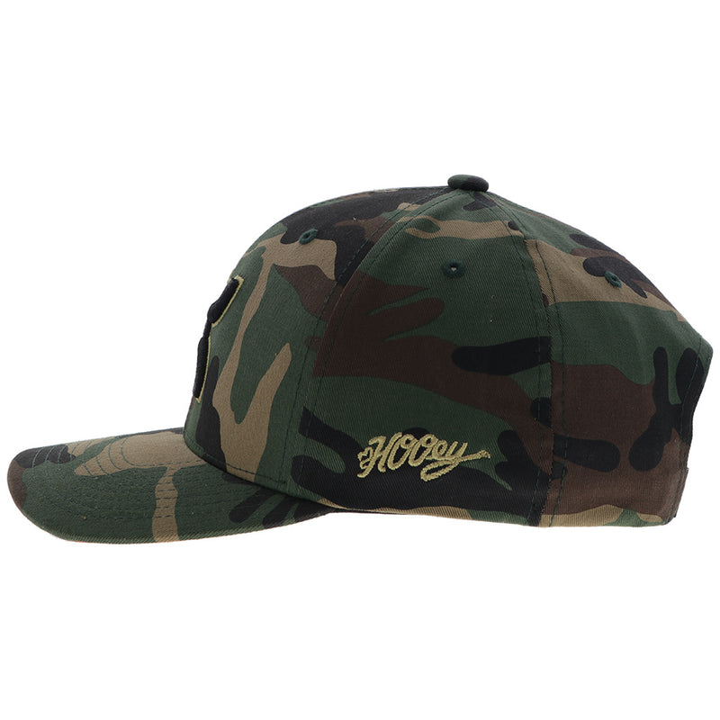 left side of camo hooey hat with embroidered hooey logo on the side