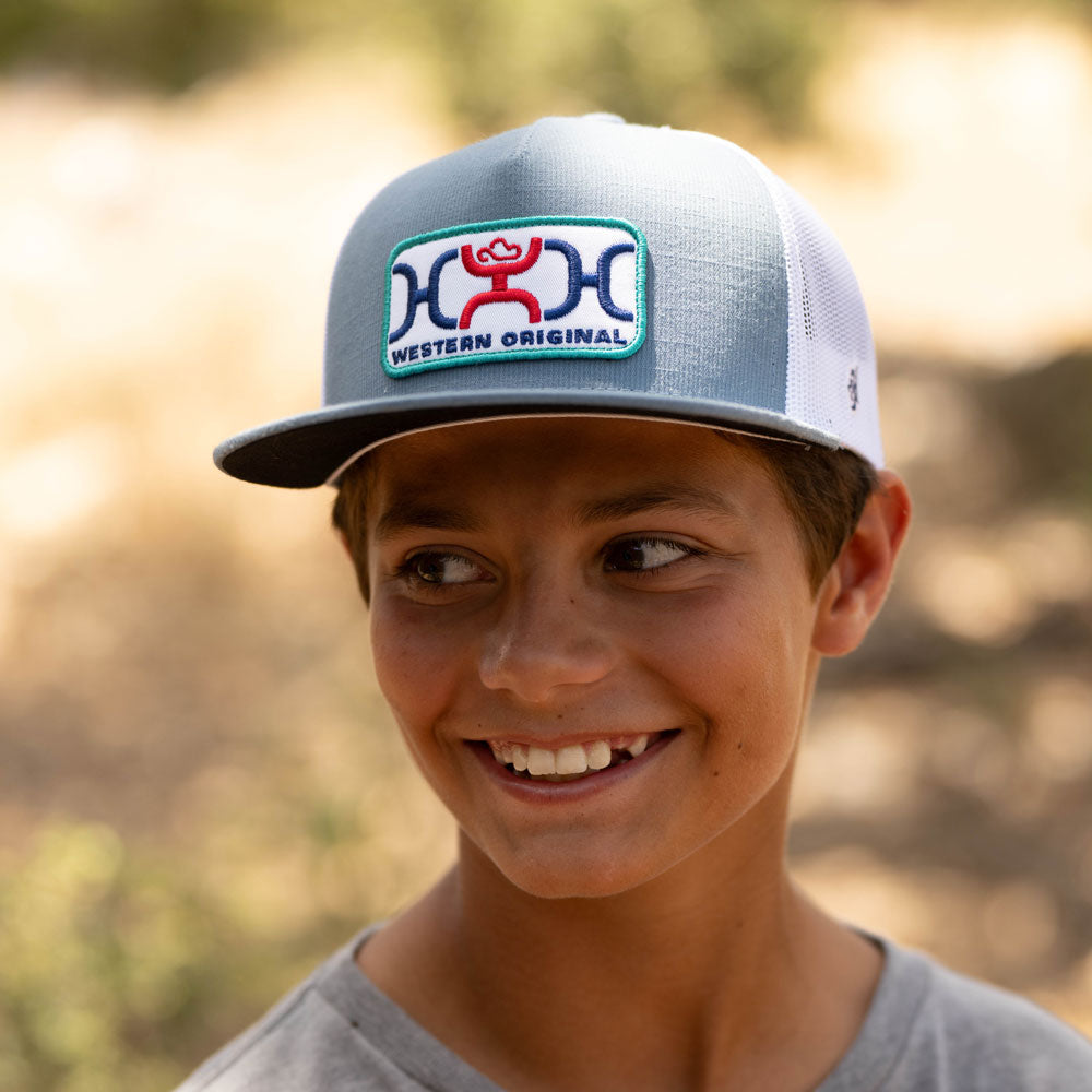 grey and white hooey original hat worn by youth model