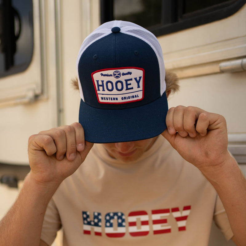 male model posing in Hooey red, white and blue gear