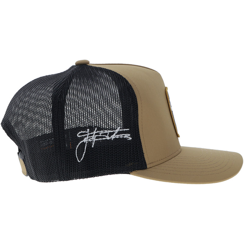 right side of the tan and black Dusty Tuckness hat with Dusty's signature embroidered in white