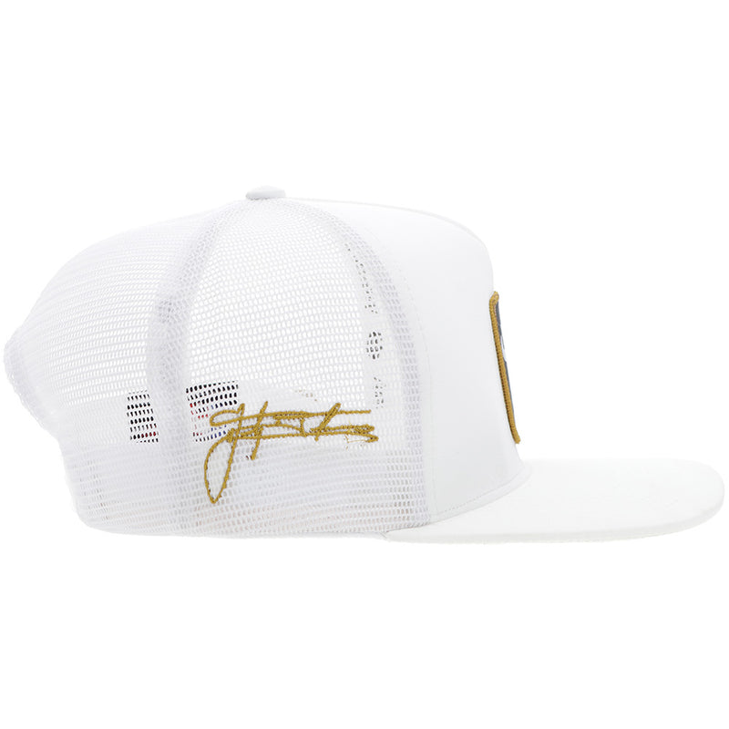 right side of Dusty Tuckness all white hat with black and gold logo patch with gold embroidered signature