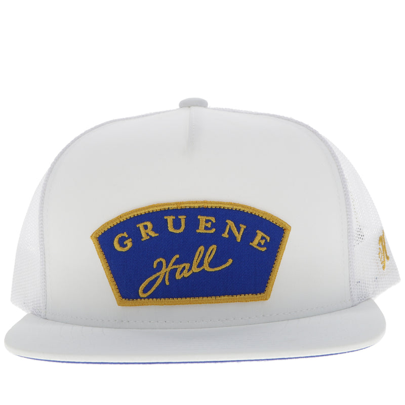 front of white on white Gruene Hall hat with blue and gold patch