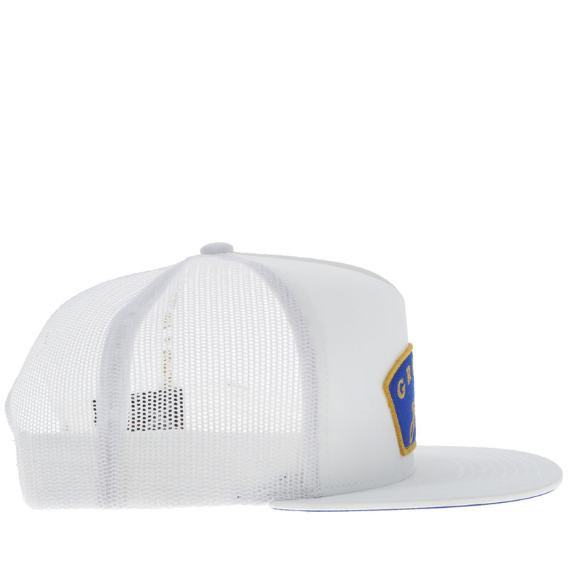 right side of white on white Gruene Hall hat with blue and gold patch