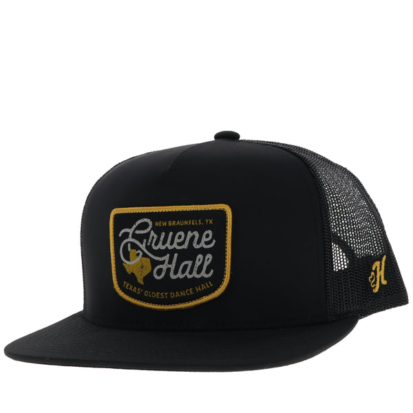 profile of black Gruene Hall hat with gold and grey patch