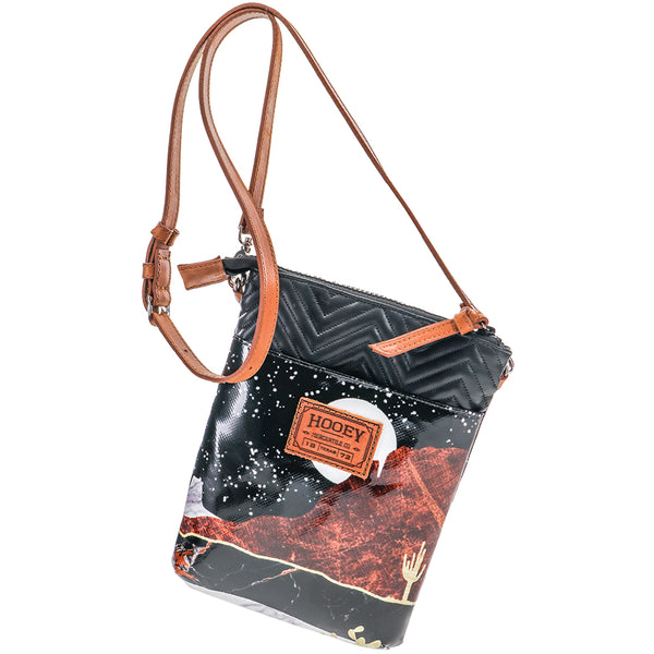 front of the desert nights crossbody bag with tooled leather chevron pattern panel around zipper