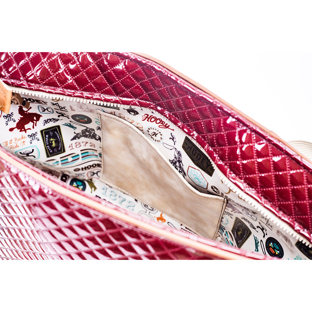 inside peek of the red quilt pattern xl tote with multi pattern interior