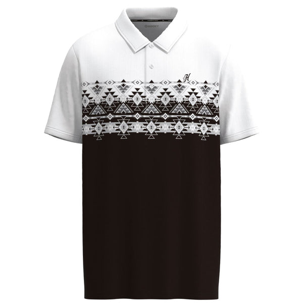 black and white golf polo with black and white Aztec pattern across the chest